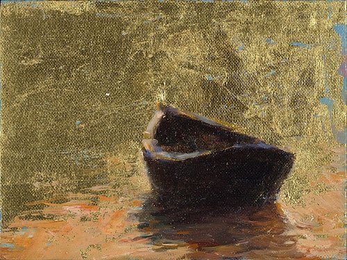 Bootje bij ondergaande zon